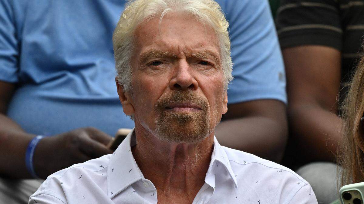Richard Branson sits on Centre Court to watch the Men's singles tennis matches on the first day of the 2024 Wimbledon Championships at The All England Lawn Tennis and Croquet Club in Wimbledon, southwest London, on July 1, 2024. (Photo by Glyn KIRK / AFP) / RESTRICTED TO EDITORIAL USE (Photo by GLYN KIRK/AFP via Getty Images)