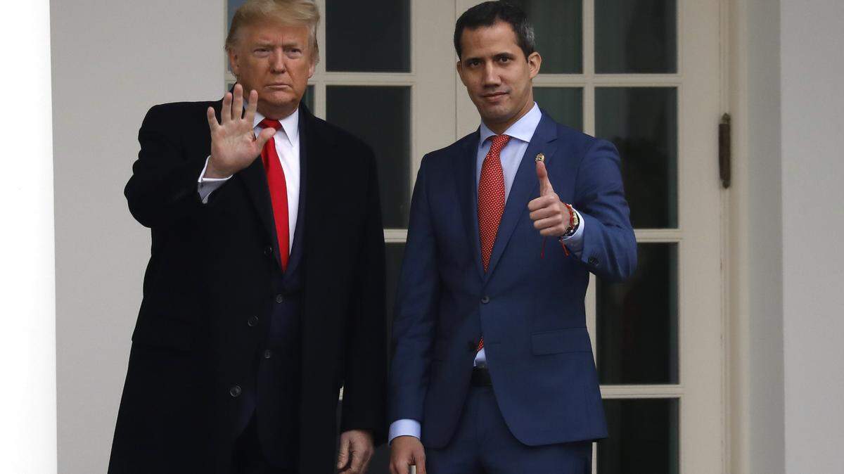 U.S. President Donald Trump welcomes Venezuelan National Assembly President and opposition leader Juan Guaidó before their meeting in the Oval Office of the White House in Washington on February 5, 2020.