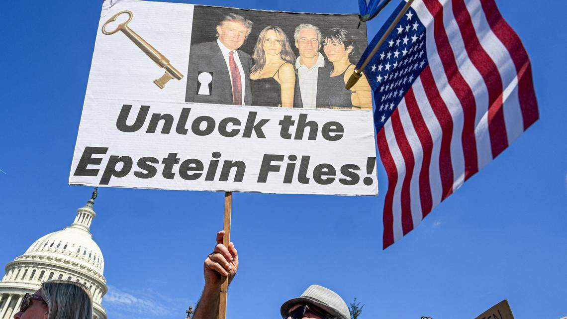 Demonstrators carry signs in support of the victims of sex offender Jeffrey Epstein and his accomplice Ghislaine Maxwell near a press conference held by US representatives outside the U.S. Capitol in Washington, DC on September 3, 2025. A US House of Representatives committee released a first batch of documents on Tuesday from the investigation into notorious sex offender Jeffrey Epstein, a case that has become a political lightning rod for the Trump administration. (Photo by ROBERTO SCHMIDT / AFP) (Photo by ROBERTO SCHMIDT/AFP via Getty Images)