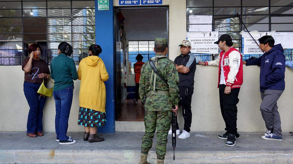 Voters line up to cast ballots in Quito, Ecuador, on Feb. 9, 2025.