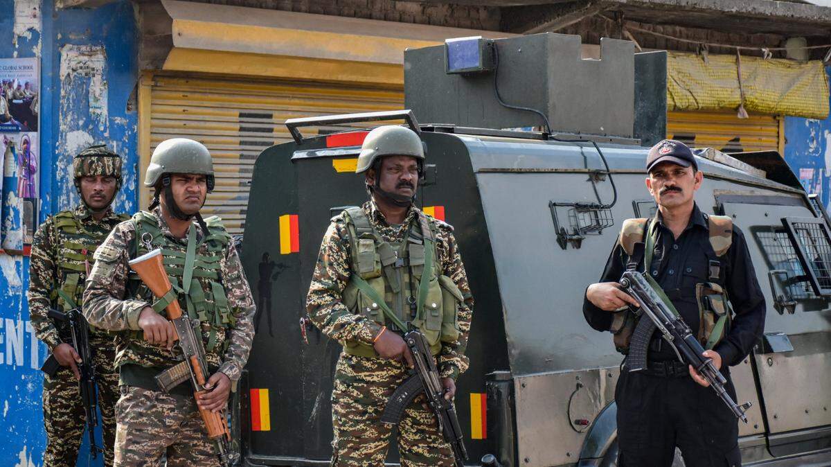 Indian paramilitary troopers stand alert after an unidentified military aircraft crashed in Wuyan area of Pampore, about 15kms from Srinagar. Two unidentified fighter jets reportedly crashed in Jammu and Kashmir shortly after India launched “Operation Sindoor”, hitting nine sites in Pakistan. Death toll soars on both sides as Pakistan says 26 killed in Indian strikes and 10 dead in Pakistani shelling along Kashmir border. (Photo by Saqib Majeed / SOPA Images/Sipa USA)