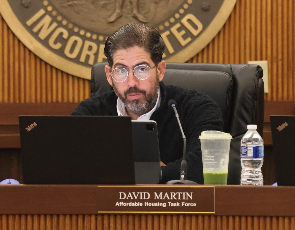 CEO of Terra Group, David Martin, who is a member of the Hialeah Affordable Housing Task Force, listens to Mayor Esteban Bovo Jr.. This company has proposed building a new city hall on the only available land in the city, on Monday, January 29, 2024 in Hialeah, Florida.