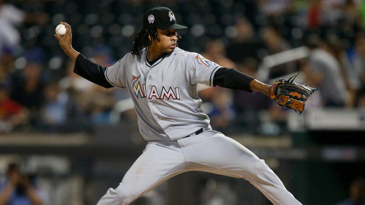 El abridor de los Marlins José Ureña lanza en el segundo inning del partido contra los Mets, el 11 de septiembre de 2018 en Nueva York.