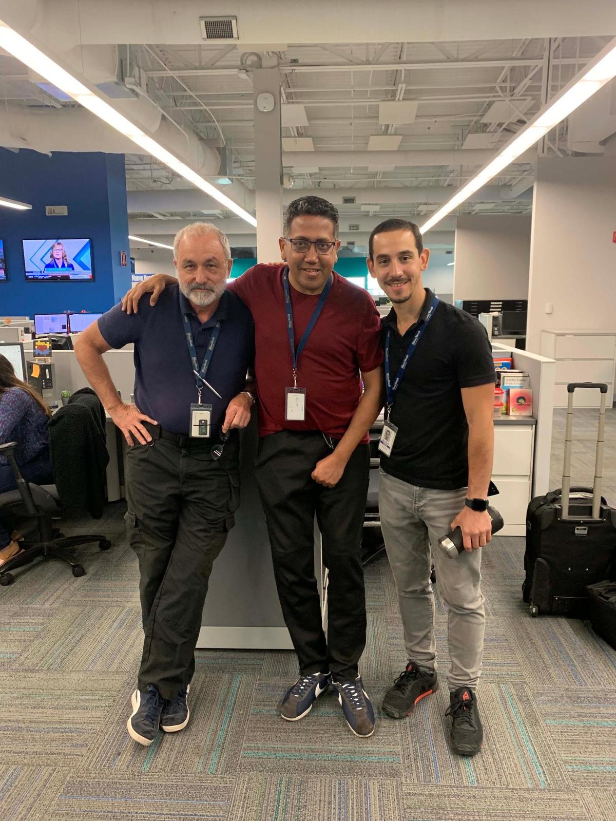 El Nuevo Herald reporter Enrique Flor, center, with Herald photojournalists José A. Iglesias, left, and Matias Ocner.