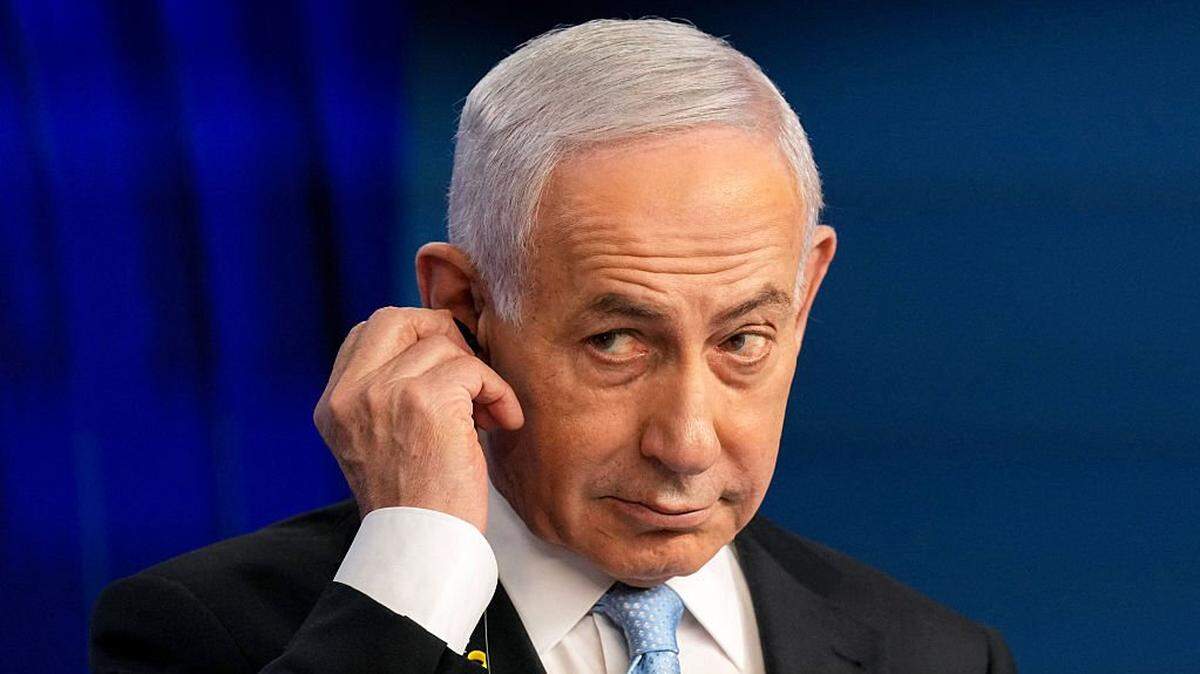 Israeli Prime Minister Benjamin Netanyahu looks on during a joint press conference with German Chancellor Friedrich Merz (not pictured) in Jerusalem on December 7, 2025. (Photo by Ariel Schalit / POOL / AFP via Getty Images)