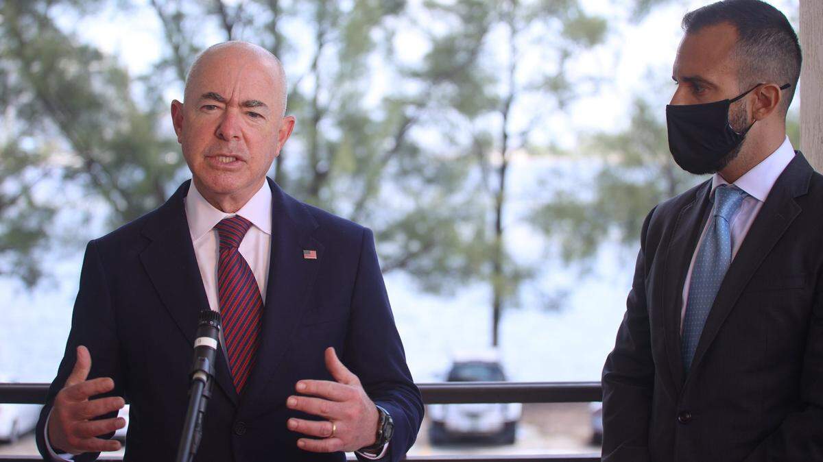 Secretary of DHS Alejandro Mayorkas speaks to members of the media after meeting with Cuban Americans at La Ermita de la Caridad in Miami, Florida on Thursday, August 19, 2021. Left to Right:Secretary of DHS Alejandro Mayorkas and L. Felice Gorordo, CEO of eMerge Americas and co-founder of Roots of Hope