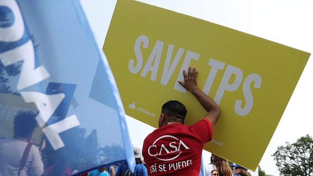 WASHINGTON, DC - SEPTEMBER 15: Supporters of the National TPS Alliance, a grassroots organization made up of immigrant rights groups, rally at the U.S. Capitol following a federal court ruling that threatens the legal standing of thousands of protected residents September 15, 2020 in Washington, DC. The U.S. Court of Appeals for the Ninth Circuit lifted an injunction on the Trump Administration's ability to erase the temporary protected status of 400,000 people from six countries, including El Salvador, Haiti, Honduras, Nepal, Nicaragua, and Sudan. The immigrants, some who have lived in the United States for decades after fleeing civil war and natural disasters, could be deported next year if they do not voluntarily leave the country. (Photo by Chip Somodevilla/Getty Images)