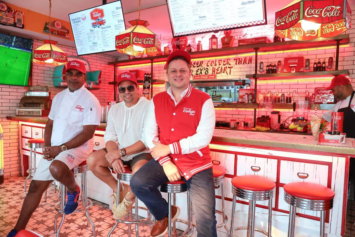 GastronomicaMiami Executive Board members Eliesteban Mena, left, Oscar Rodriguez, center, and Earl J Campos de Vine, right, get their picture taken inside their restaurant, El Cuban Diner, located at 1620 SW Eighth St., in Miami, Fla., on Tuesday, Nov. 4, 2025.