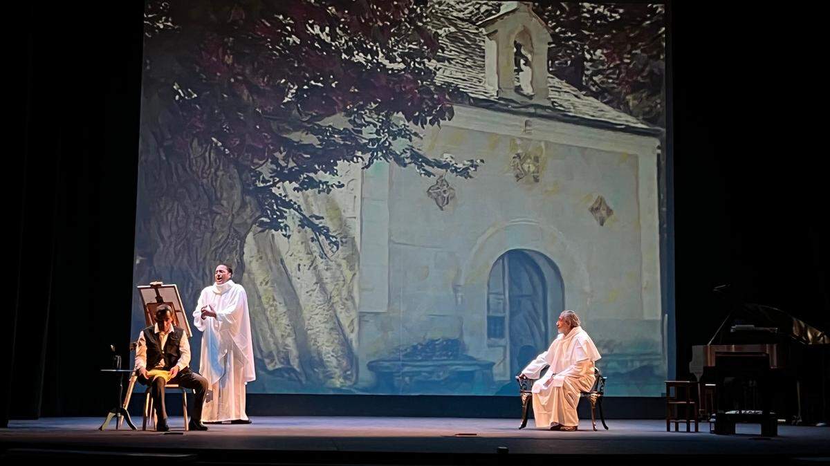 Rafael (Fer du Port) canta la romanza “La roca fría del Calvario” mientras Pablito (Karel Morell) y el Prior (Carlos Jimeno) escuchan.