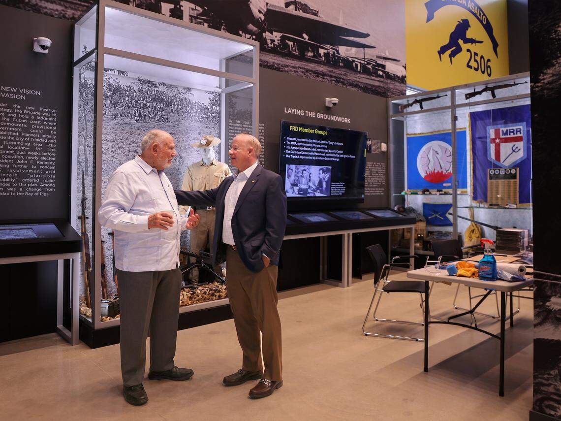 Rafael Montalvo, president of the Bay of Pigs Veteran Association, left, and Carlos Luis, museum president, tour the new Bay of Pigs Bridage 2506 Museum as it prepared for opening on Saturday, April 18, 2026. 