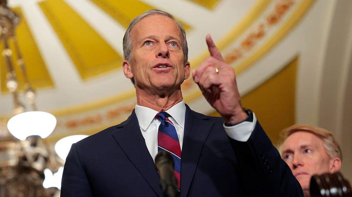 WASHINGTON, DC - DECEMBER 09: Senate Majority Leader John Thune (R-SD) speaks to reporters following a Senate Republican policy luncheon at the U.S. Capitol on December 09, 2025 in Washington, DC. The senators discussed a variety of topics including a vote expected this week on a Democratic proposal to extend expiring Obamacare subsidies. (Photo by Heather Diehl/Getty Images)