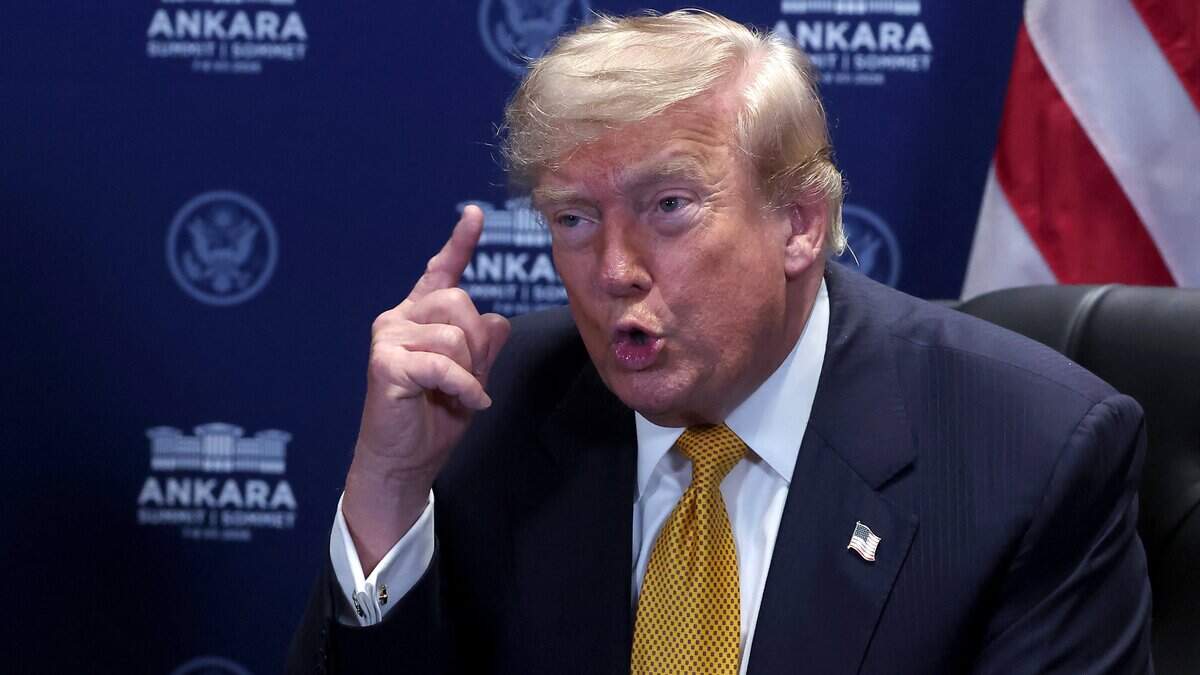 US President Donald Trump reacts as he meets with NATO Secretary General on the sidelines of the NATO summit in Ankara, on July 8, 2026. The summit comes at a fraught time for the 77-year-old transatlantic alliance, with the US President demanding members make good on a pledge to ramp up defence spending as Washington takes a step back from Europe. (Photo by Filip SINGER / POOL / AFP via Getty Images)