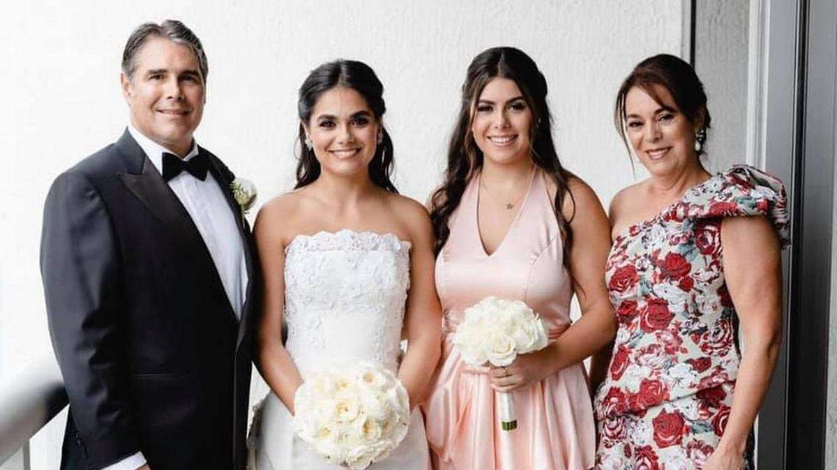 Richard “Ricky” George Rovirosa and his wife, María Teresa Rovirosa, right, with their daughters Alejandra, second from left, and Adriana at Alejandra’s wedding in 2019.