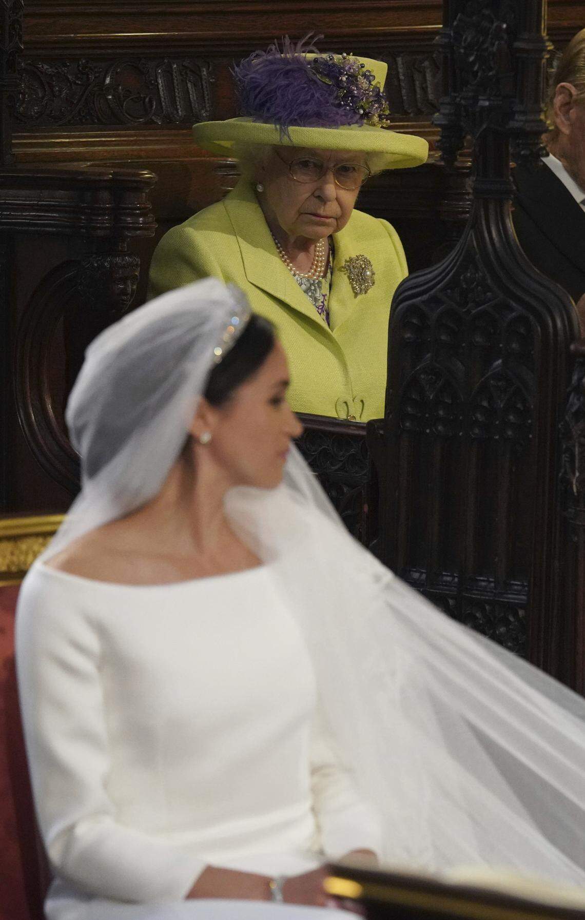 Queen Elizabeth II looks on during the wedding of Prince Harry and Meghan Markle at St George's Chapel, Windsor Castle, Saturday May 19, 2018. (Jeff J Mitchell/PA via AP)