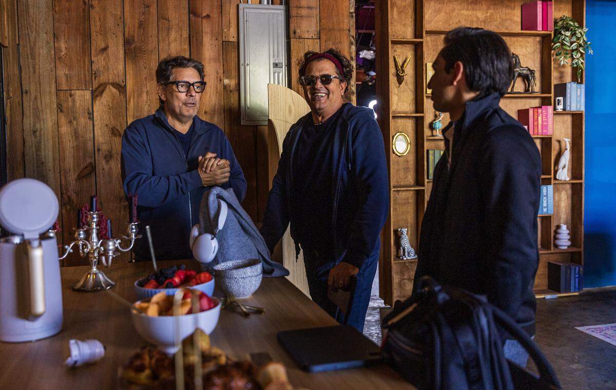 Founder Alejandro Pimentel (far left welcomes artist Carlos Vives (center) as he arrives to attend the “Lo Dije o lo Pensé show in the Básico Stream, studio, the digital channel based in Miami created by Pimentel, Leo Lavazza and Adrian Santucho, last April, 100% aimed at the U.S. Hispanic market, on Tuesday November 11, 2025.