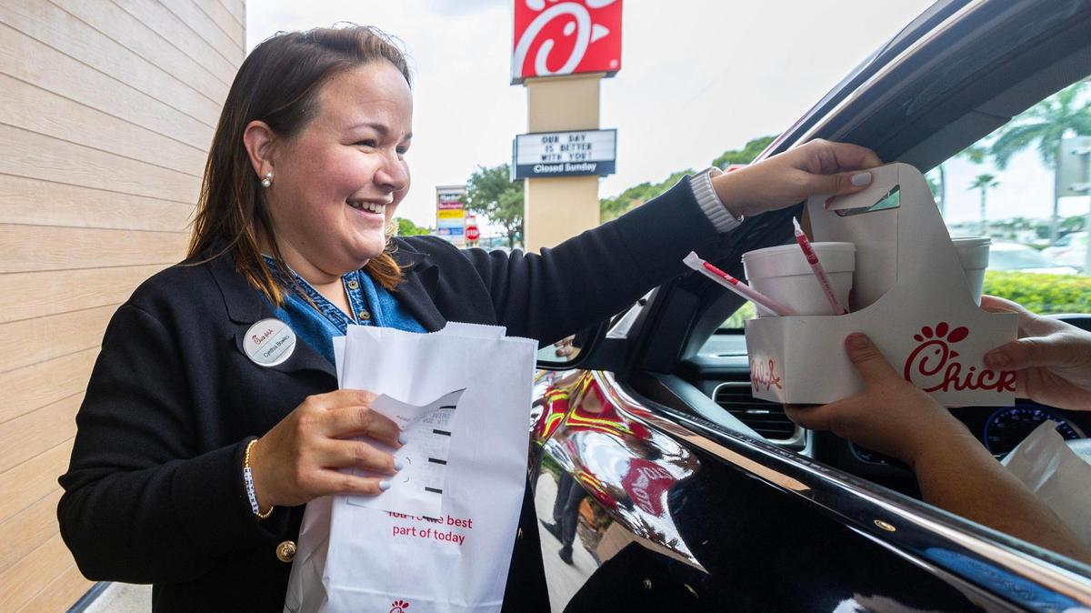 Cynthia Bowles, operator of the first Chick-fil-A in Hialeah, serves customers on Sept. 14, 2023 outside the restaurant she runs at 1600 W 49th St. in Hialeah.