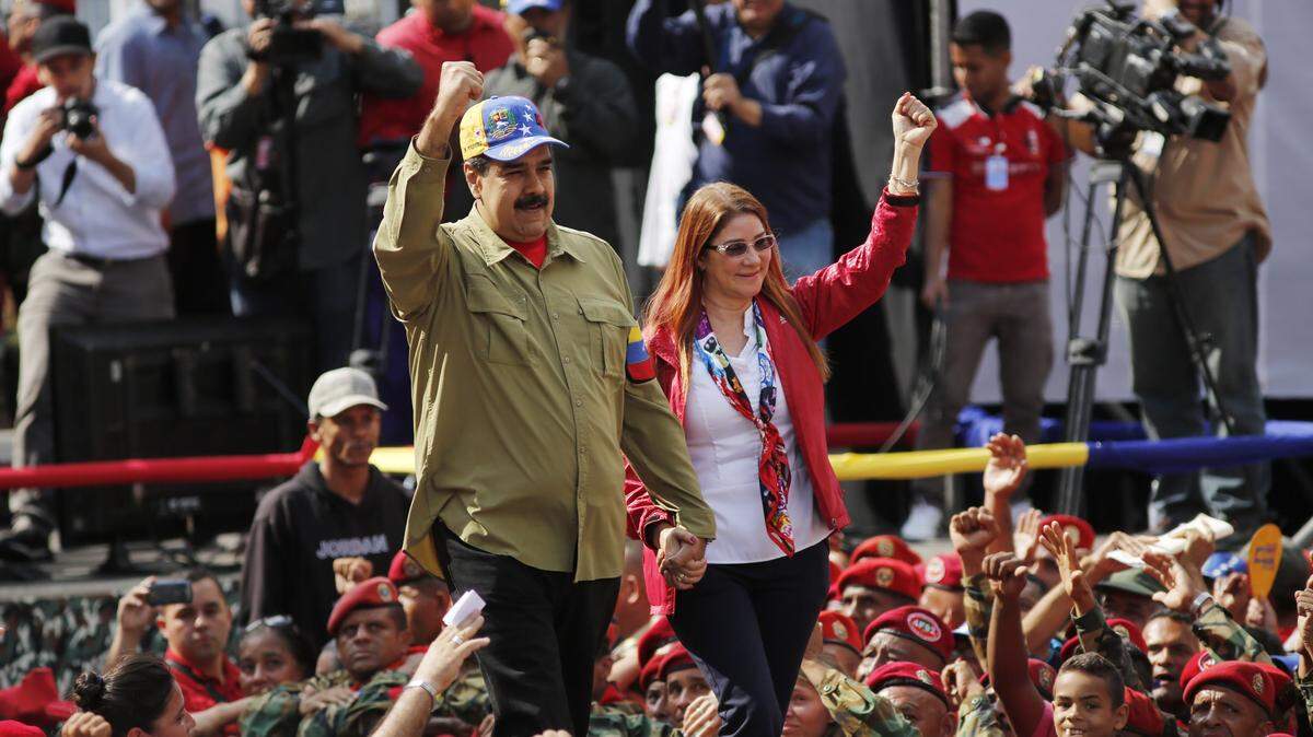 El presidente de Venezuela, Nicolás Maduro, y la primera dama, Cilia Flores, en un evento en Caracas este domingo 4 de febrero de 2018. 