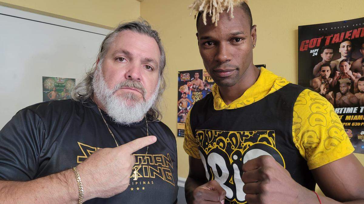 HUGO NORIEGA con el entrenador Osmiri Fernández en el gimnasio de Miami.
