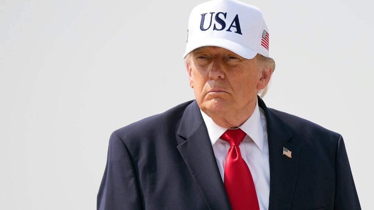 BISMARCK, NORTH DAKOTA - JULY 01: U.S. President Donald Trump walks to board Air Force One as he departs Bismarck Municipal Airport on July 01, 2026 in Bismarck, North Dakota. Trump traveled to North Dakota to attend the Theodore Roosevelt Presidential Library dedication. (Photo by Andrew Harnik/Getty Images)