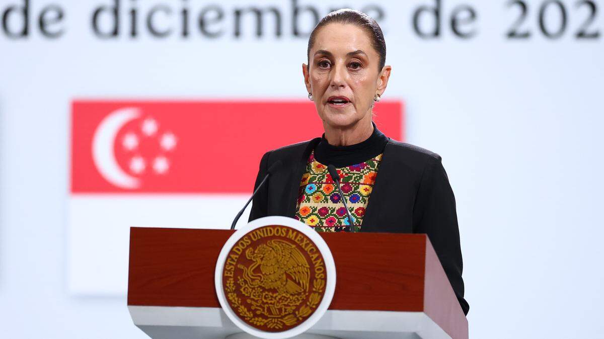 MEXICO CITY, MEXICO - DECEMBER 01: President of Mexico Claudia Sheinbaum speaks during a joint press conference as part of an official visit of the President of Singapore Tharman Shanmugaratnam to Mexico at Palacio Nacional on December 01, 2025 in Mexico City, Mexico. (Photo by Eloisa Sanchez/Getty Images)