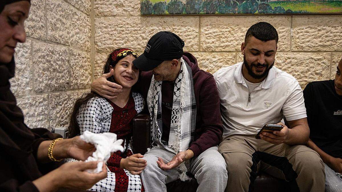 RAMALLAH, WEST BANK - OCTOBER 13:  Moments of families warmly welcoming released Palestinian prisoners returning from Israeli jails on October 13, 2025 in Ramallah, West Bank. Israel is expected to release 250 Palestinian prisoners, as well as 1,700 detainees from Gaza, as part of the ceasefire deal that will see the return of Israeli hostages held by Hamas.  (Photo by Faiz Abu Rmeleh/Getty Images)