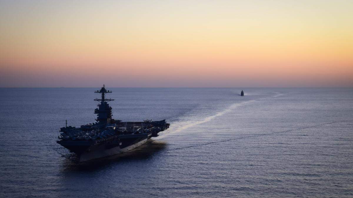 MEDITERRANIAN SEA - OCTOBER 2: In this handout provided by the U.S. Navy, The USS Gerald R. Ford (CVN 78), and Italian Navy Offshore Patrol Vessel ITS Paolo Thaon di Revel (P430), flagship of Standing NATO Mine Countermeasures Group 2, operate in the Mediterranean Sea, Oct. 2, 2025. Gerald R. Ford, a first-in-class aircraft carrier and deployed flagship of Carrier Strike Group 12, is on a scheduled deployment in the U.S. 6th Fleet area of operations to support the warfighting effectiveness, lethality and readiness of U.S. Naval Forces Europe-Africa, and defend U.S., Allied and partner interests in the region. (Photo by Ada Willis/U.S. Navy via Getty Images)