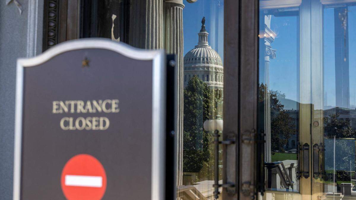 A sign indicates that the Library of Congress in Washington, DC, is closed on October 21, 2025 due to the US government shutdown. The US government shutdown dragged into a third week, with Congress gridlocked in a clash over spending and no resolution in sight to a crisis that has already cost thousands of jobs. (Photo by DANIEL HEUER / AFP) (Photo by DANIEL HEUER/AFP via Getty Images)