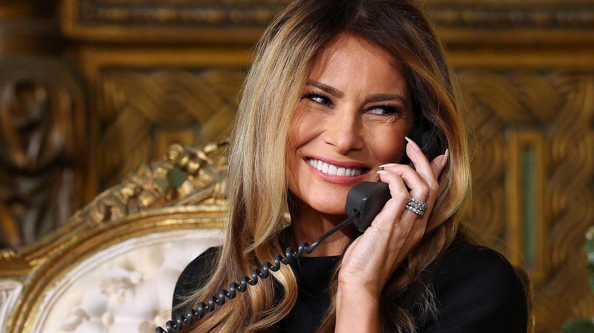 PALM BEACH, FLORIDA - DECEMBER 24: First lady Melania Trump calls children as she participates in tracking Santa Claus' movements with the North American Aerospace Defense Command (NORAD) Santa Tracker on Christmas Eve at the Mar-a-Lago resort on December 24, 2025 in Palm Beach, Florida. This is the 70th year that NORAD has publicly tracked Santa's sleigh on its global rounds. (Photo by Tasos Katopodis/Getty Images)