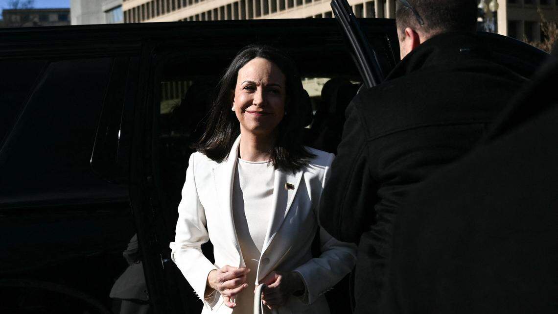 Venezuelan opposition leader Maria Corina Machado exits a vehicle as she arrives near the White House ahead of a meeting with US President Donald Trump, in Washington, DC on January 15, 2026. (Photo by Brendan SMIALOWSKI / AFP via Getty Images)