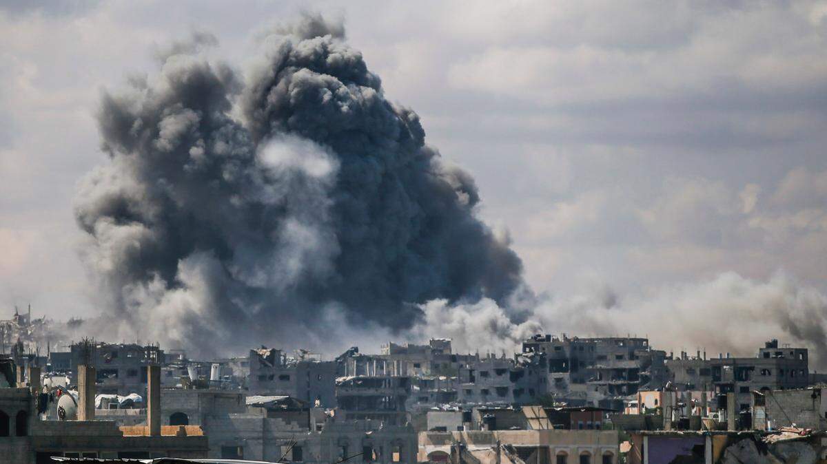 (250506) -- GAZA, May 6, 2025 (Xinhua) -- Smoke rises following an Israeli airstrike in Gaza City, on May 6, 2025. Gaza’s health authorities said on Tuesday that 2,507 Palestinians had been killed and 6,711 wounded since the resumption of Israeli strikes, bringing the total death toll since the war began in October 2023 to 52,615, with 118,752 injured. (Photo by Mahmoud Zaki/Xinhua) (Photo by Xinhua/Sipa USA)