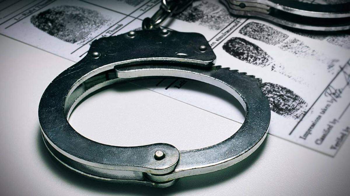 Two family members were arrested 27 years after an Oklahoma 81-year-old relative was found dead in her home, officials said.