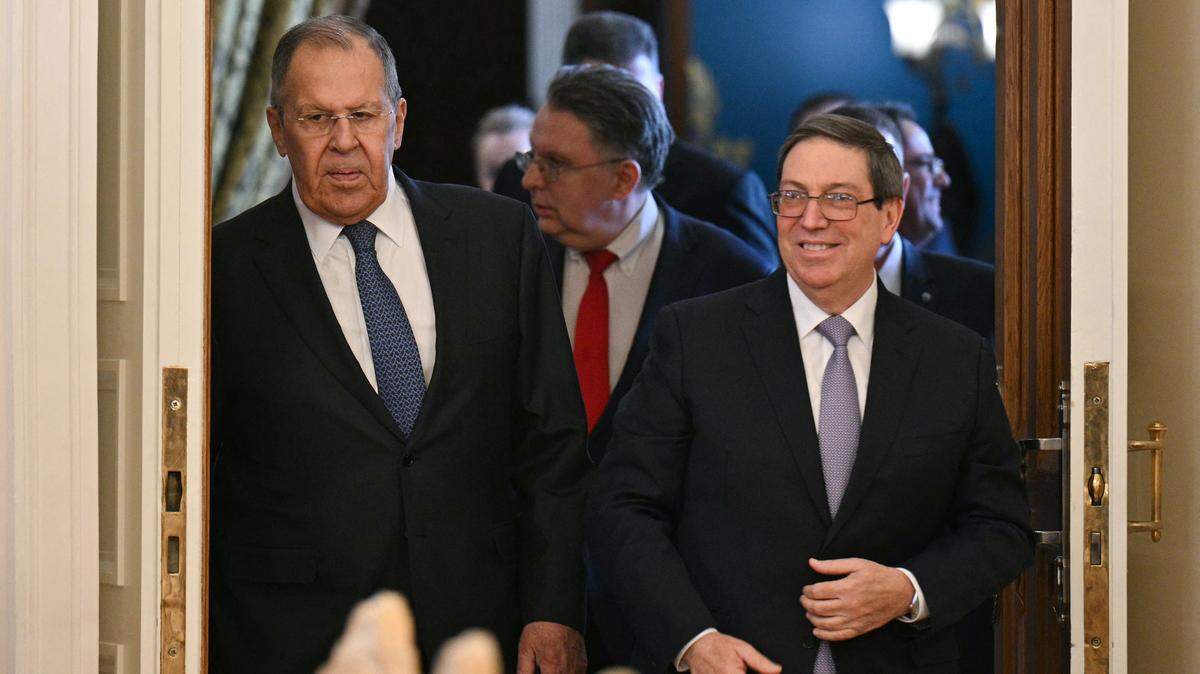 Russian Foreign Minister Sergei Lavrov and Cuba's Foreign Minister Bruno Rodriguez enter a hall during a meeting in Moscow on February 18, 2026. (Photo by HECTOR RETAMAL / POOL / AFP via Getty Images)