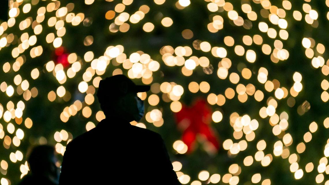 People are gathering during a tripledemic. Should you mask up?