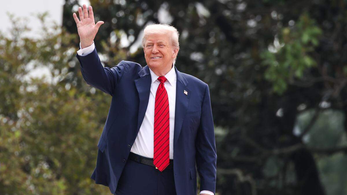 Apple CEO Tim Cook presented President Donald Trump, seen here, with a one-of-a-kind gladd plaque made in Harrodsburg, Ky., during a new conference Wednesday, Aug. 6, 2025.