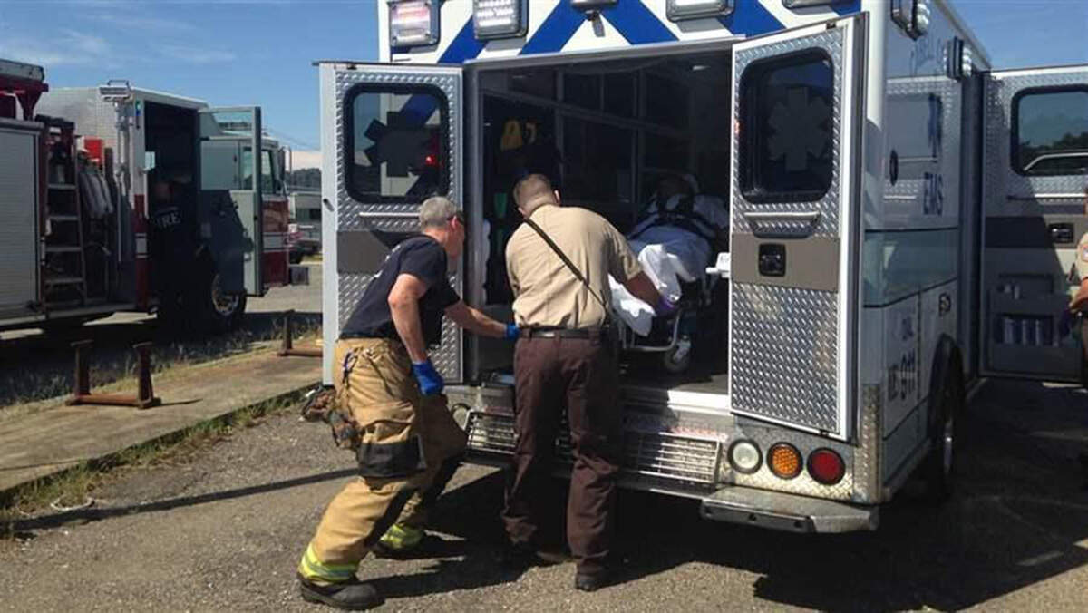 Emergency medical personnel load an overdose victim into an ambulance in Huntington, West Virginia. Nationwide, an increasing number of people who are rescued from a drug overdose refuse to be transported to a hospital.(Christine Vestal/The Pew Charitable Trusts)
