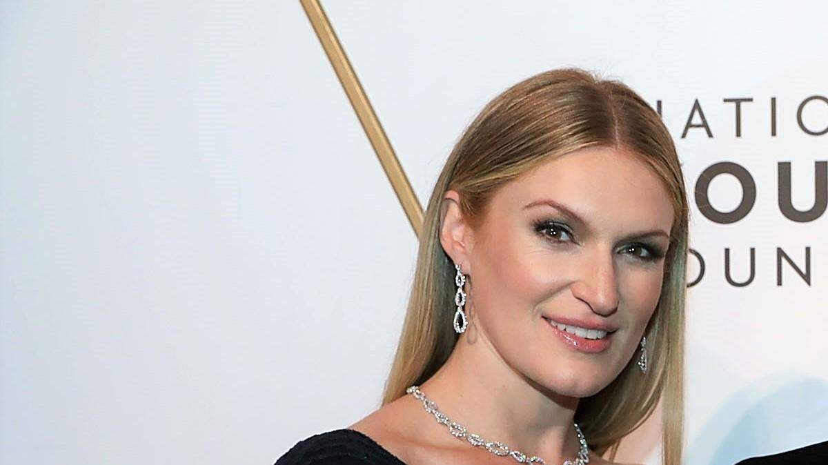 Sarah Arison con Jorge y Darlene Pérez.