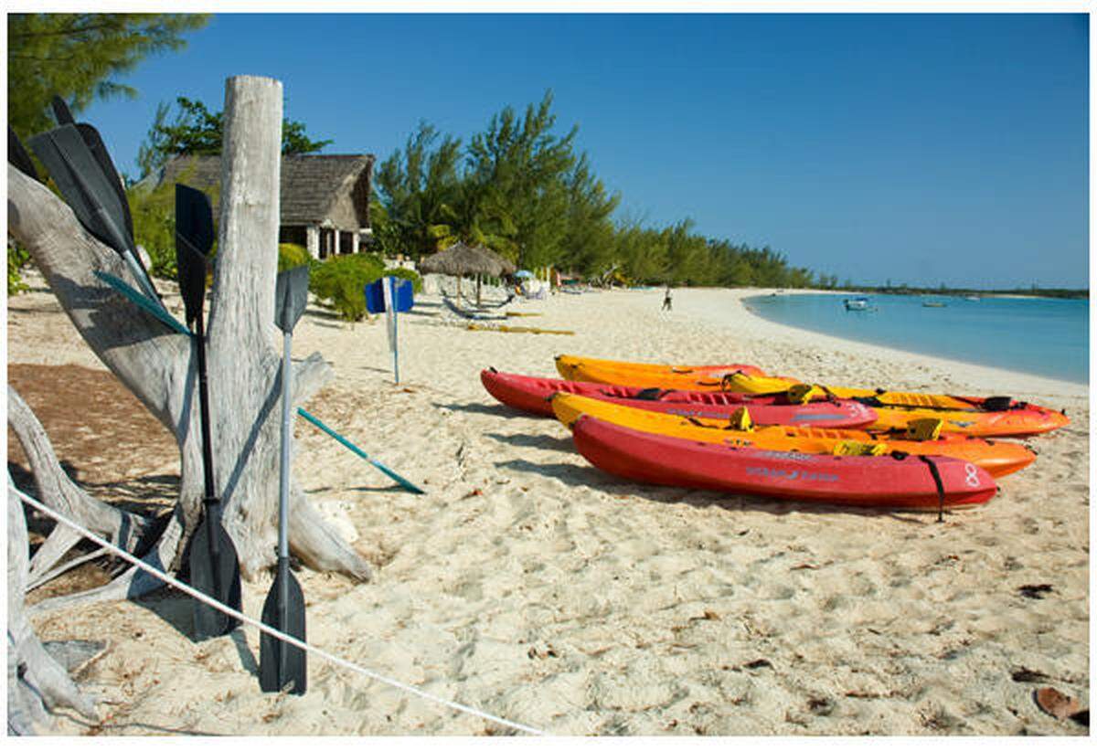 Kayaks on the beach in Nassau in the Bahamas.