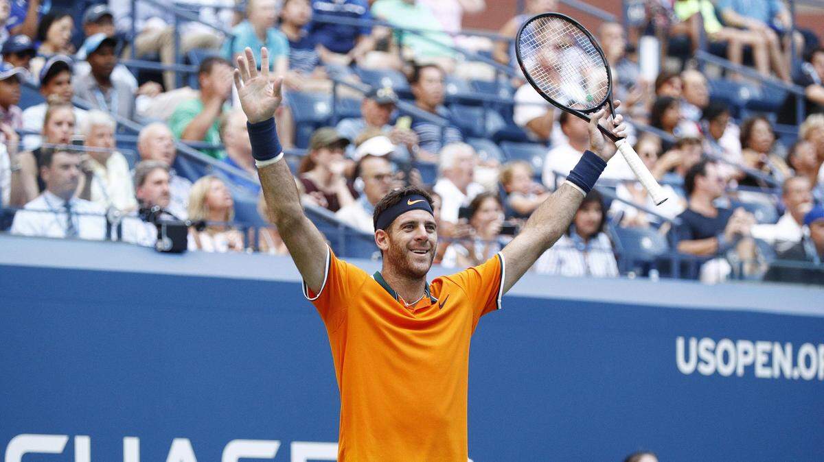 El argentino Juan Martín del Potro celebra al vencer al estadounidense John Isner, el  4 de agosto de 2018, durante un partido de tenis del Abierto de Estados Unidos.