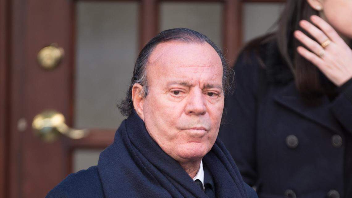 NEW YORK, NY - NOVEMBER 03: Julio Iglesias departs the funeral of fashion designer Oscar De La Renta at St. Ignatius Of Loyola on November 3, 2014 in New York City. at St. Ignatius Of Loyola on November 3, 2014 in New York City. (Photo by Dave Kotinsky/Getty Images)