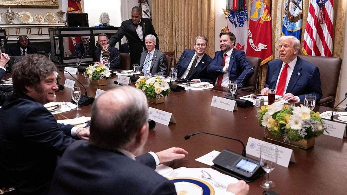 US President Donald Trump (R) meets with Argentina's President Javier Milei (2nd L) in the Cabinet Room at the White House in Washington, DC, on October 14, 2025. (Photo by ANDREW CABALLERO-REYNOLDS / AFP) (Photo by ANDREW CABALLERO-REYNOLDS/AFP via Getty Images)