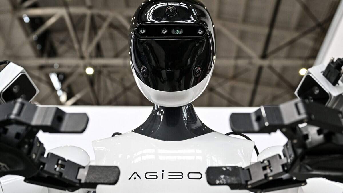 A robot from AgiBot is seen during the Global Developer Conference, organised by the Shanghai AI Industry Association, in Shanghai on February 21, 2025. (Photo by Hector RETAMAL / AFP) (Photo by HECTOR RETAMAL/AFP via Getty Images)