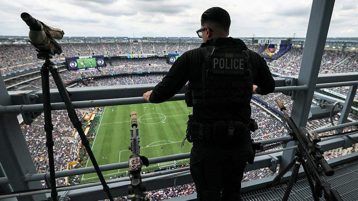 A US Secret Service sniper stands guard ahead of the FIFA Club World Cup 2025 final football match between England's Chelsea and France's Paris Saint-Germain at the MetLife Stadium in East Rutherford, New Jersey on July 13, 2025. (Photo by CHARLY TRIBALLEAU / AFP) (Photo by CHARLY TRIBALLEAU/AFP via Getty Images)