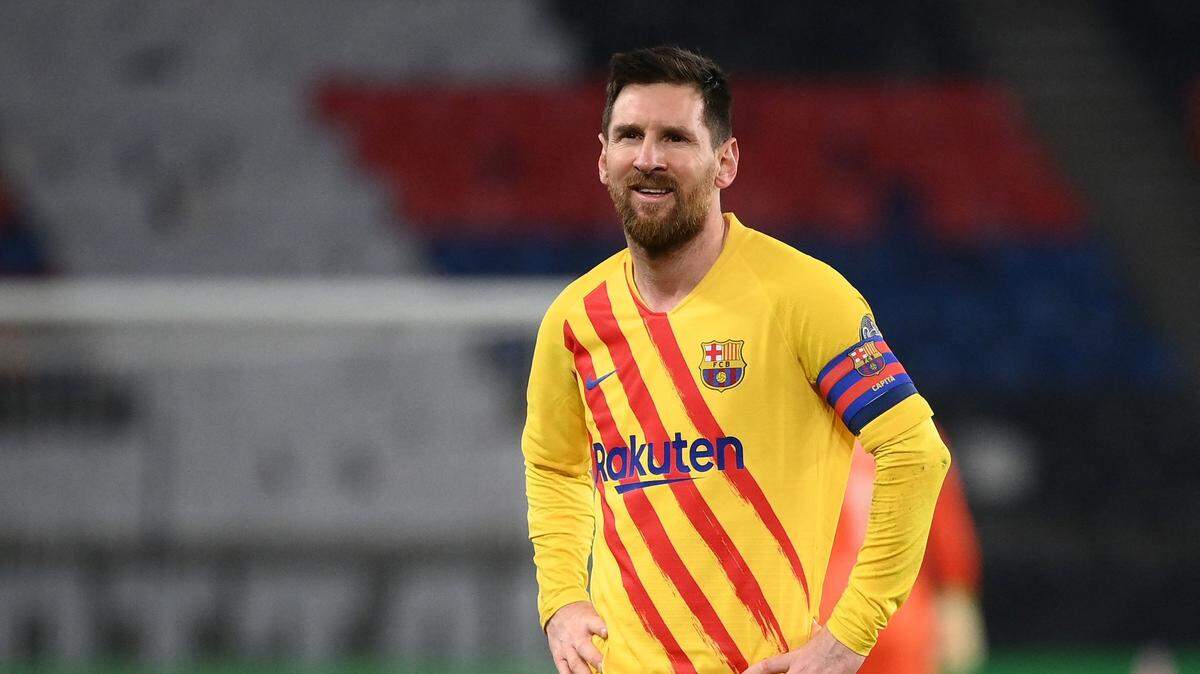 Barcelona’s Argentinian forward Lionel Messi reacts during the UEFA Champions League round of 16 second leg football match between Paris Saint-Germain (PSG) and FC Barcelona at the Parc des Princes stadium in Paris, on March 10, 2021. (Photo by FRANCK FIFE / AFP) (Photo by FRANCK FIFE/AFP via Getty Images)