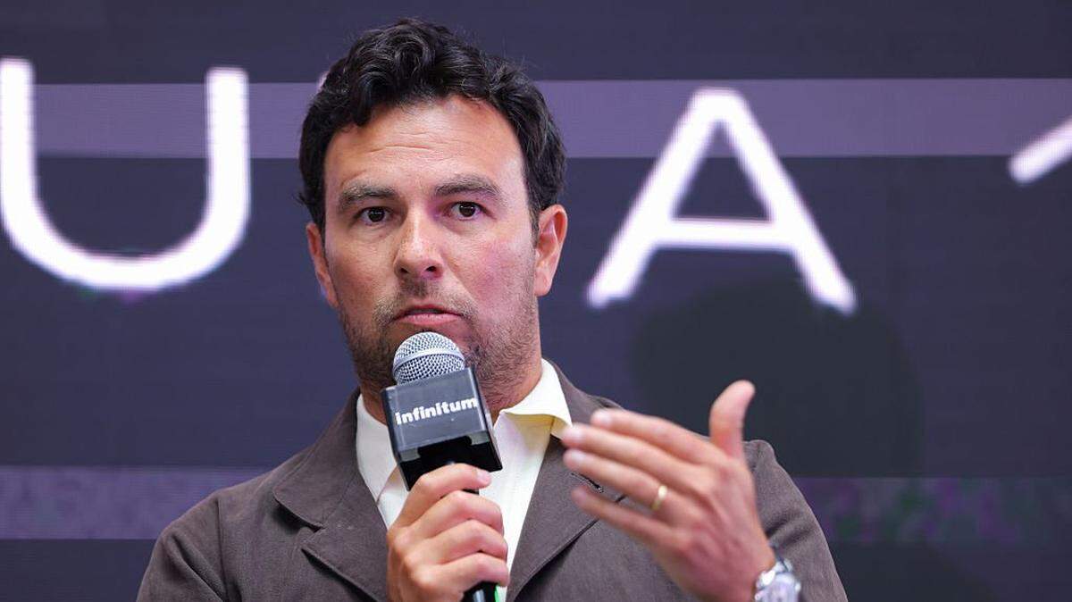 Driver Sergio Perez addresses the media after announcing his return to Formula 1 in a press conference at Teatro Telcel on August 27, 2025 in Mexico City, Mexico. Sergio "Checo" Perez will join Cadillac Formula 1 Team in 2026 as one of the drivers alongside Valtteri Botas. Perez has raced for 14 seasons as part of Sauber, Force India, Racing Point and Red Bull teams. (Photo by Agustin Cuevas/Getty Images)