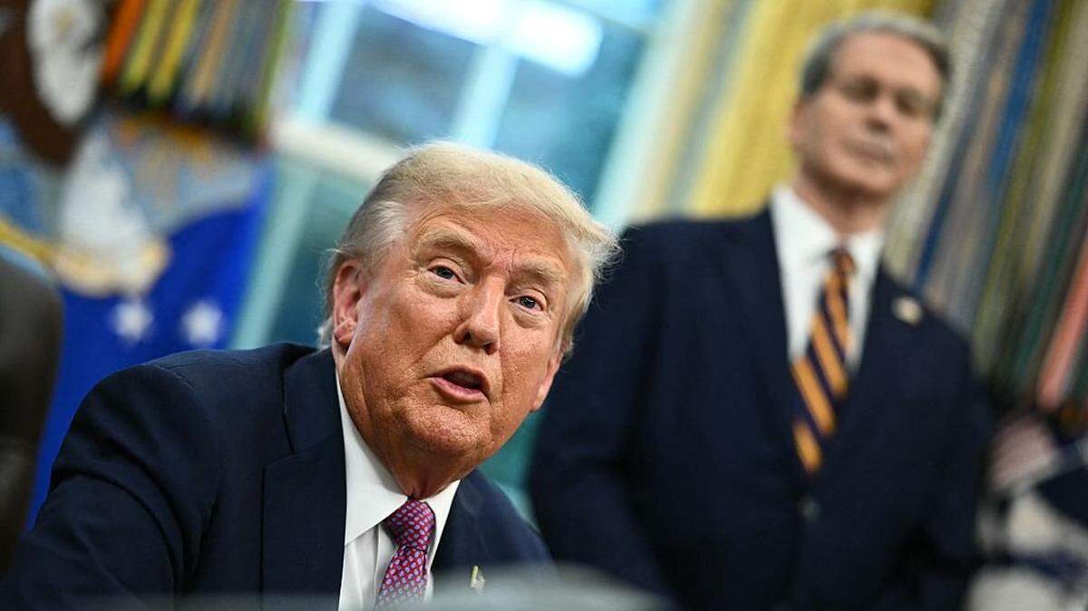 US President Donald Trump speaks as the Secretary of the Treasury Scott Bessent listens as he signs executive orders in the Oval Office of the White House in Washington, DC on September 5, 2025. (Photo by Mandel NGAN / AFP) (Photo by MANDEL NGAN/AFP via Getty Images)
