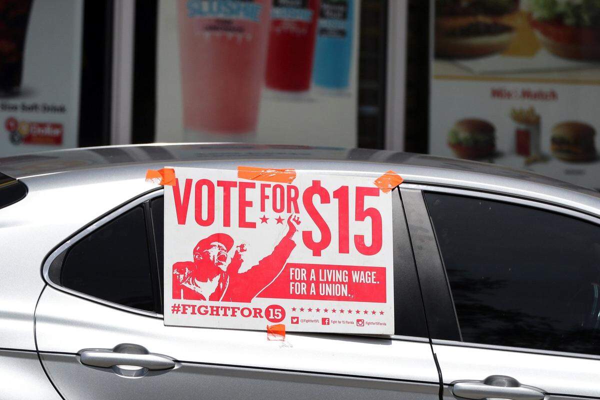 A caravan carrying protesting fast-food employees with the Florida for $15 coalition in Fort Lauderdale, Fla., on Thursday, Sept. 16, 2020. Many restaurant owners are unhappy with President Joe Biden’s plan to more than double the federal minimum wage to $15 an hour.(Amy Beth Bennett/South Florida Sun Sentinel/TNS)