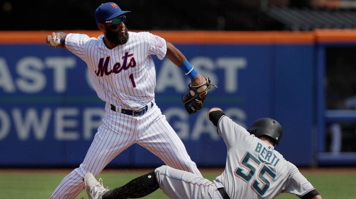 The Miami Marlins’ Jon Berti is forced out at second base against the New York Mets on Wednesday, Aug. 7, 2019, at Citi Field.