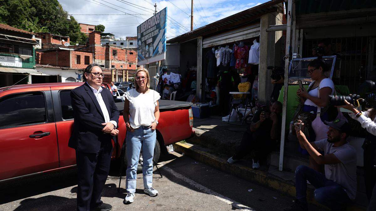 Mariana González, daughter of Venezuelan opposition leader Edmundo González and wife of lawyer and political prisoner Rafael Tudares, and her lawyer José Vicente Haro, speak to the press upon their arrival at El Rodeo prison on Jan. 9, 2026, in Miranda, Venezuela.