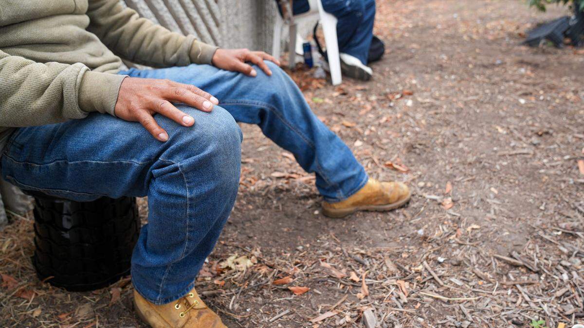Day laborers waiting for work at the Home Depot in Paramount, California, on June 9, 2025, risk ICE detention and deportation but said they were willing to take the risk because they need money to support their families.