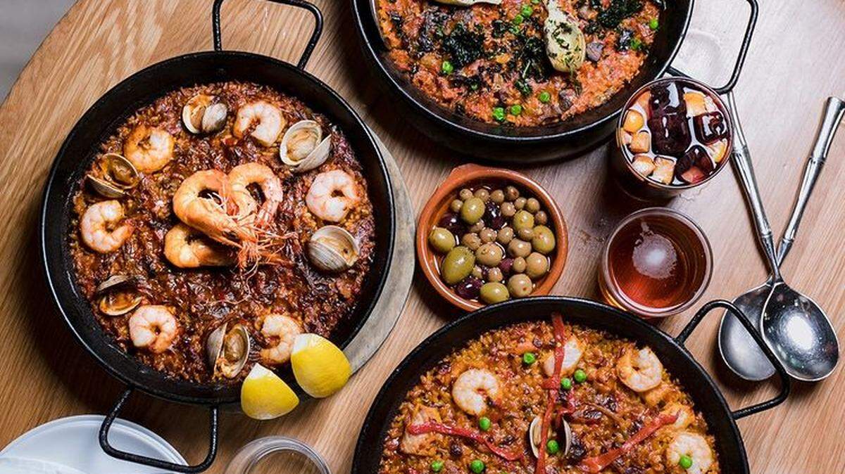 Delight in classic tapas like tortilla and garlic shrimp, as well as the signature Huevos Bulla.